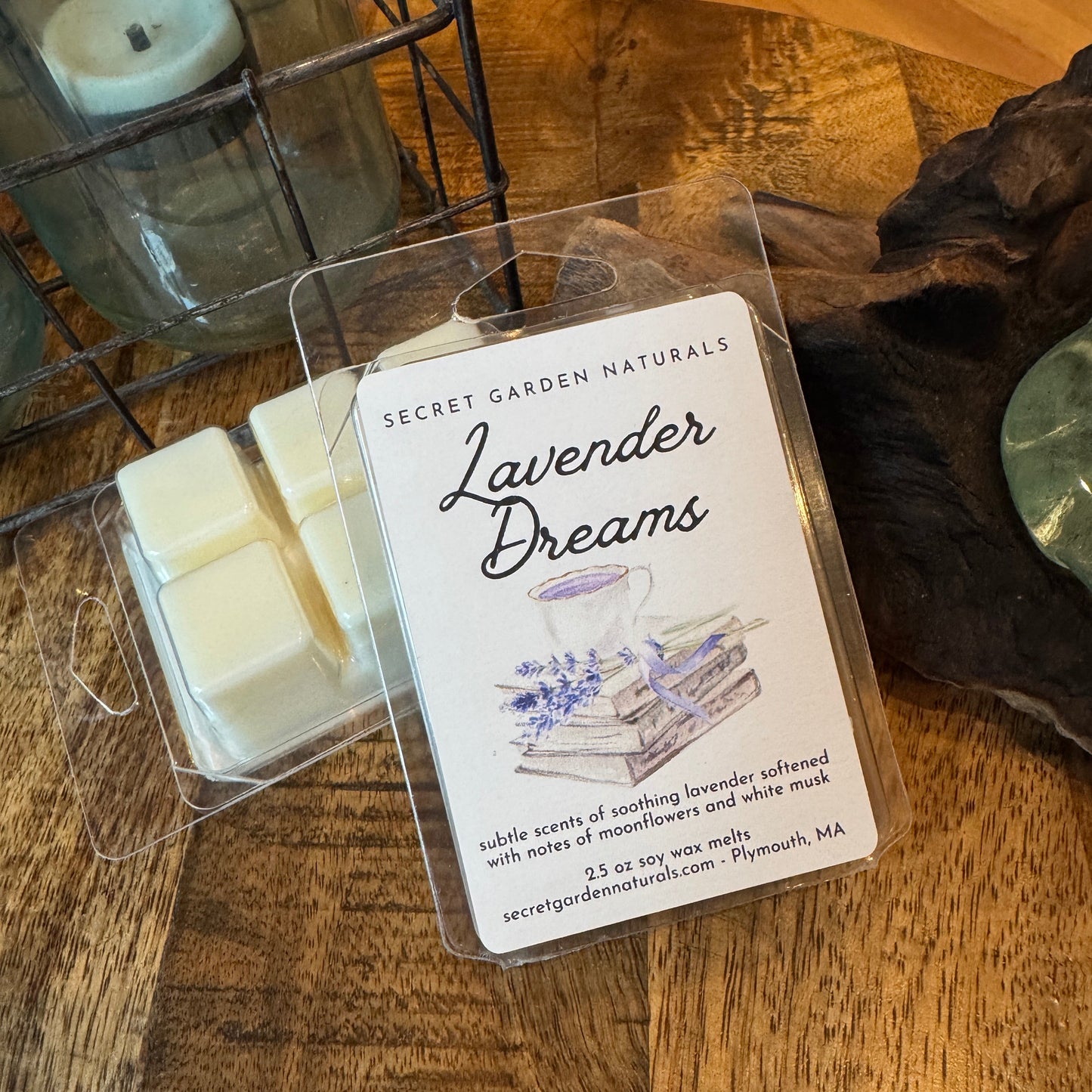 Packaged wax melts with a 'Lavender Dreams' label on a wooden surface.