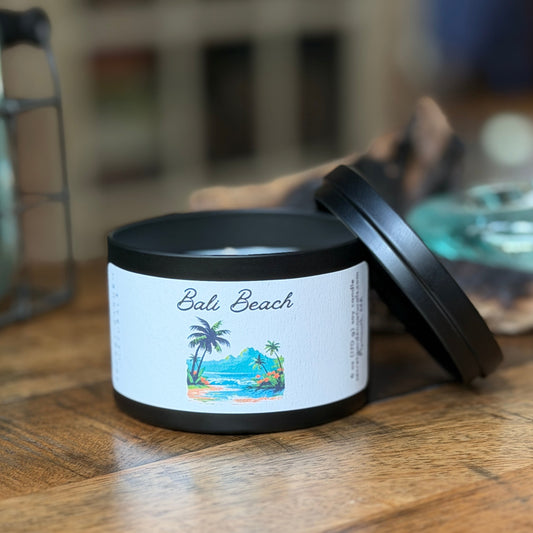 Bali Beach 6 oz candle tin on a wooden surface