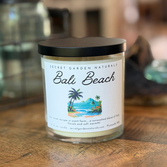 10 ounce Bali Beach candle on a wooden surface